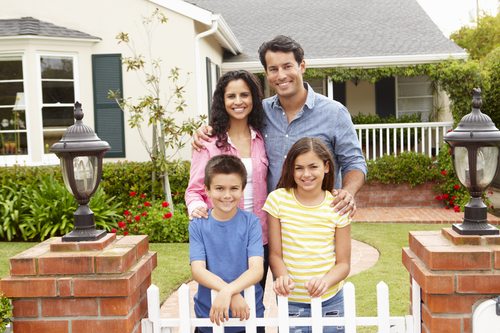 Hispanic family outside home